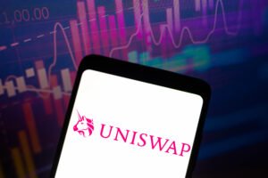 NADA NEWS february 1, 2022, brazil. in this photo illustration, the logo of the uniswap, a cryptocurrency exchange that uses a decentralized network protocol is displayed on a smartphone screen.