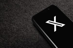 NADA NEWS x logo on smartphone screen on black textured background. astana, kazakhstan june 13, 2024.